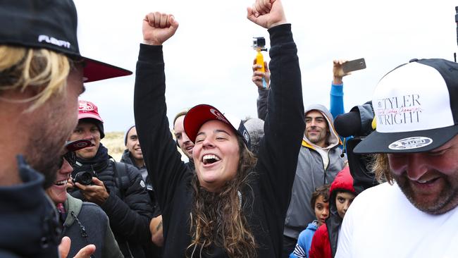 Tyler Wright celebrates after winning her maiden world crown at the Roxy Pro France.