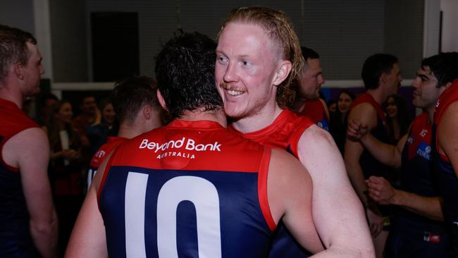 Angus Brayshaw and Clayton Oliver of the Demons embrace after their win over the Suns. Picture: Getty Images