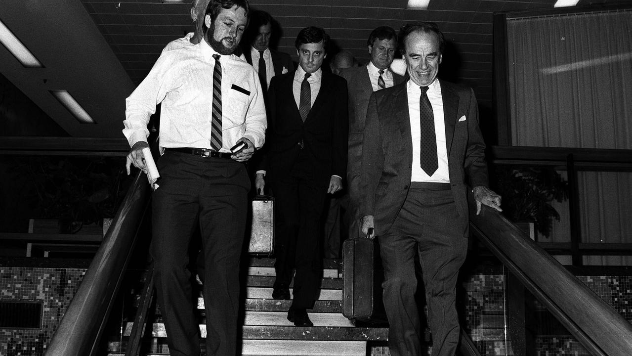 Rupert Murdoch, right, at the Courier Mail's building at Bowen Hills in 1987. Picture: Paul EdwardsThe Courier-Mail