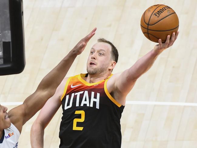 SALT LAKE CITY, UTAH - MAY 26: Joe Ingles #2 of the Utah Jazz shoots over Desmond Bane #22 of the Memphis Grizzlies in Game Two of the Western Conference first-round playoff series at Vivint Smart Home Arena on May 26, 2021 in Salt Lake City, Utah. NOTE TO USER: User expressly acknowledges and agrees that, by downloading and/or using this photograph, user is consenting to the terms and conditions of the Getty Images License Agreement. (Photo by Alex Goodlett/Getty Images)