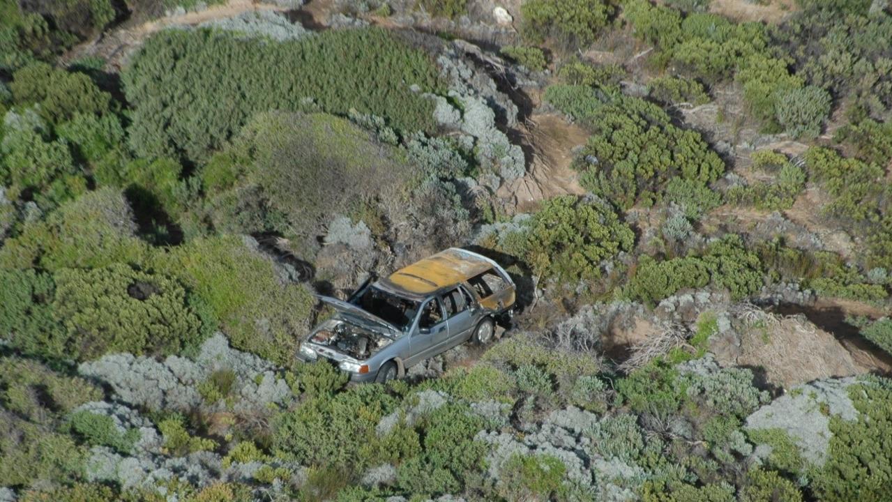 The burnt-out station wagon belonging to Chris Jarvis.