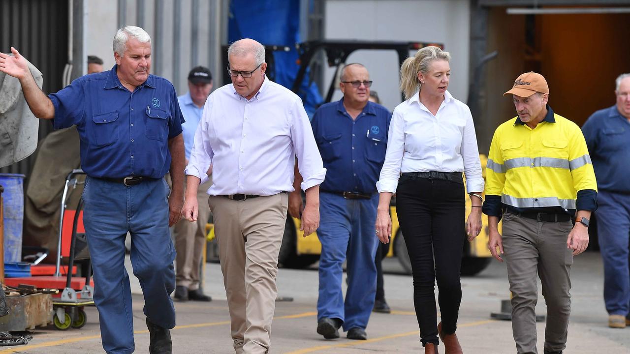 Prime Minster Scott Morrison visits Nolan Meats, Gympie, after devastating floods. Pictured with Terry Nolan (left) Bridget McKenzie MP and Llew O'Brien MP. Photo: Patrick Woods.