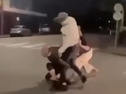 A still image from mobile phone footage of an attack on Beaumont St, Hamilton, where a 22-year-old man was stabbed and later died. Picture: Supplied