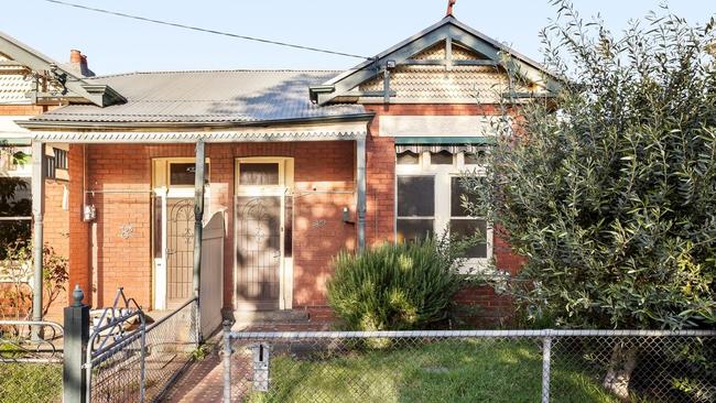 Melbourne house prices were up by nearly $2000 in October, with properties like 8A William St, Abbotsford, for sale with a $900,000-$990,000 price guide.