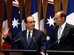 Tony Abbott and Francois Hollande have discussed a free trade deal with the EU and climate.