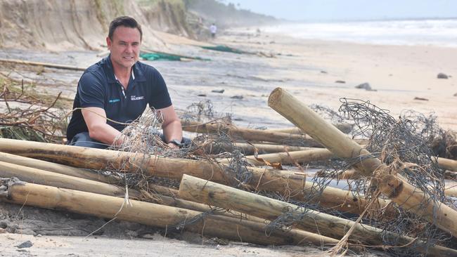 Councillor Darren Taylor inspects the damage on Tuesday caused by huge seas from Cyclone Alfred at Narrowneck. Picture: Glenn Hampson.