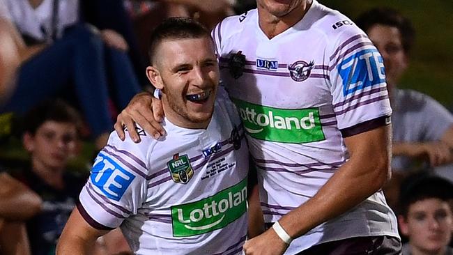 Jackson Hastings of the Sea Eagles celebrates after scoring a try.