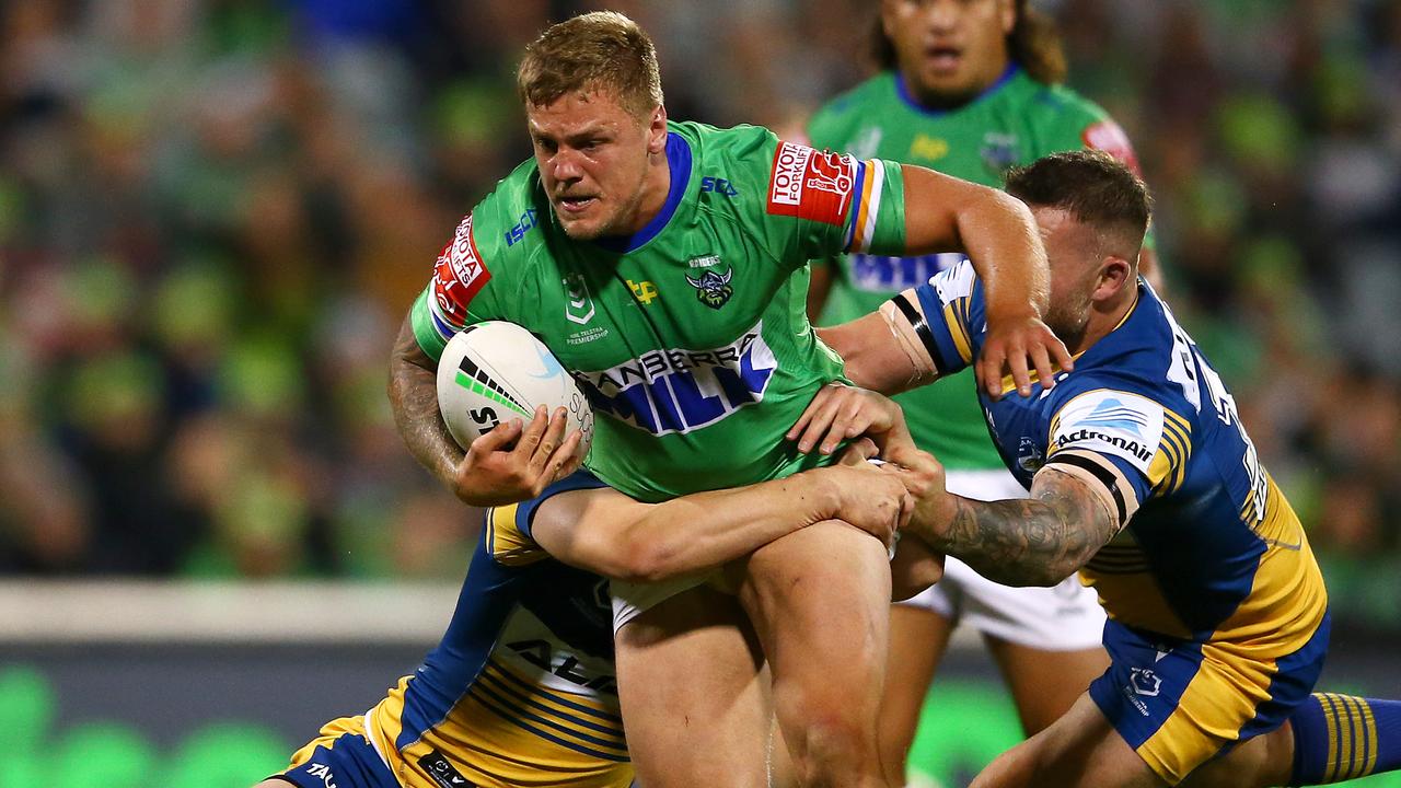 CANBERRA, AUSTRALIA - APRIL 17: Ryan Sutton of the Raiders is tackled during the round six NRL match between the Canberra Raiders and the Parramatta Eels at GIO Stadium on April 17, 2021, in Canberra, Australia. (Photo by Matt Blyth/Getty Images)