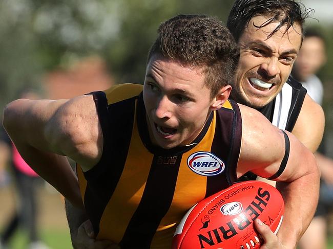 Christopher Muratore of Parkside tackles Brandon Lester of Yarraville during the WRFL Division 2 match between Yarraville Seddon Eagles and Parkside played at Yarraville on Saturday 21st April, 2018.