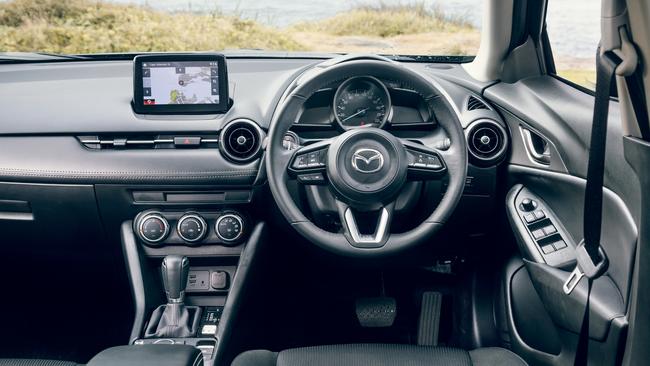 The CX-3’s cabin is comfortable, but a touch dated.