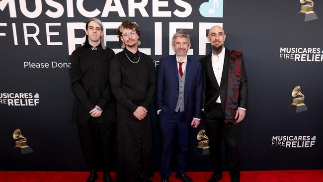 LOS ANGELES, CALIFORNIA – FEBRUARY 02: Nick Azinas, Mike Hicks, and Alpha Wolf attend the 67th Annual GRAMMY Awards on February 02, 2025 in Los Angeles, California. (Photo by Matt Winkelmeyer/Getty Images for The Recording Academy)