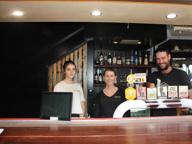 Commercial Hotel staff Georgia White, someone and Liam Thorpe.