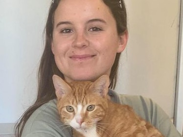 Julia Allen, 19, of Mona Vale, has adopted Big Ginge, the cat she rescued after he was thrown from a moving car at 60km/h, from SAFE Animal Rehoming at Roseville. Picture: SAFE Animal Rehoming