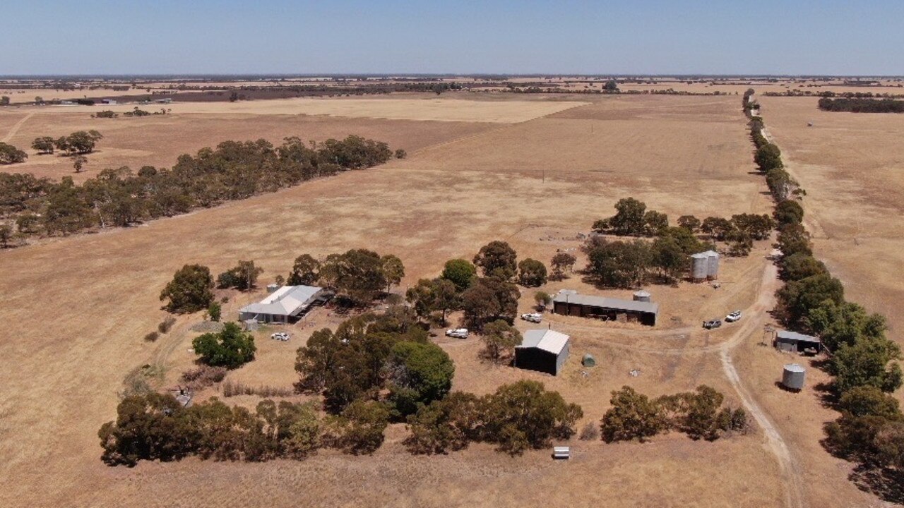 An aerial shot showing the house and surrounding area.