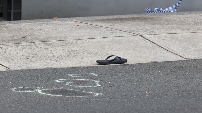 A man has been found lying on a road with serious injuries after reportedly being hit by a car on Wednesday morning. A thong, believed to be the man’s, was found at the scene. Picture: David Caird