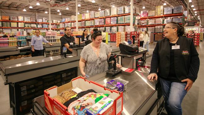 Second out the door is Tabetha Gibson a the Gold Coast's first Costco opens at Coomera. Picture: Glenn Campbell