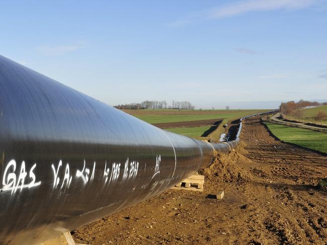 Generic picture of a gas pipeline being constructed in a hilly landscape.