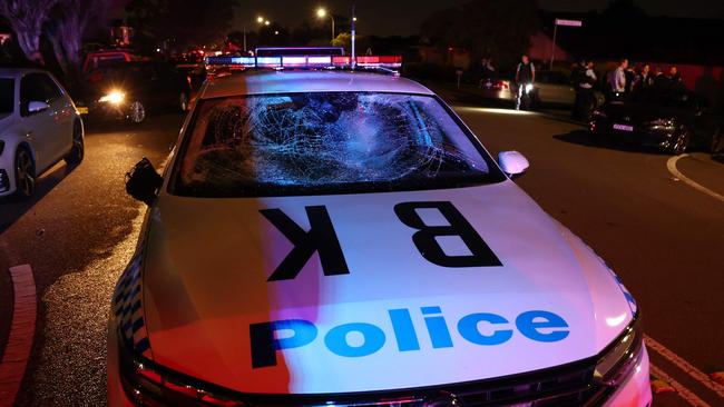 A smashed police car. Picture: David Gray/AFP