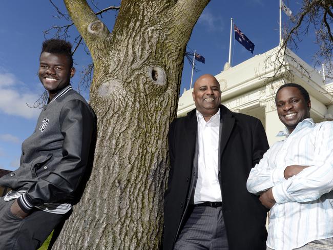 Abeselom Nega (centre) was running state government funded programs for troubled youths and refugees.