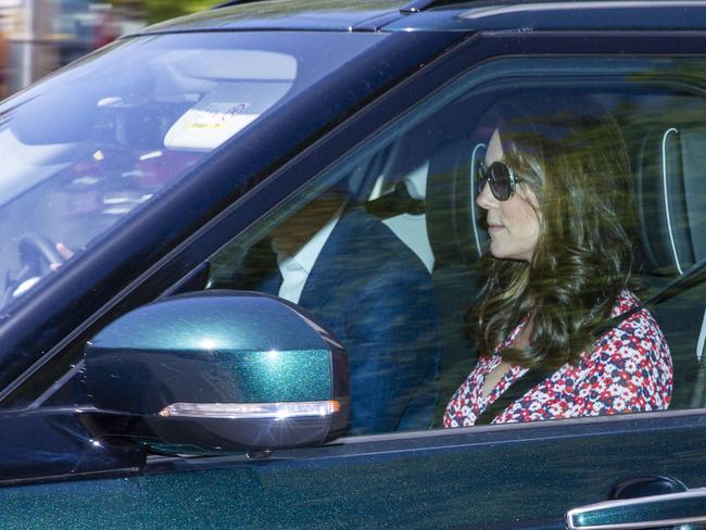 Prince William and Kate Middleton are seen driving out of Kensington Palace.  Picture:  Splash