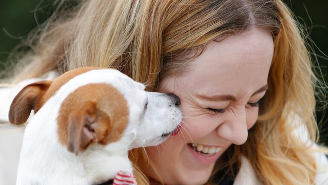 Elle Morgan-Thomas with Henry the Jack Russell terrier. The dynamic duo are Delta Society Therapy dog volunteers who visit every Saturday at the nearby nursing home, Opal Windward Manor. Picture: Luke Drew