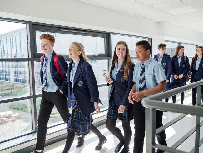 High school students walking to their next class.