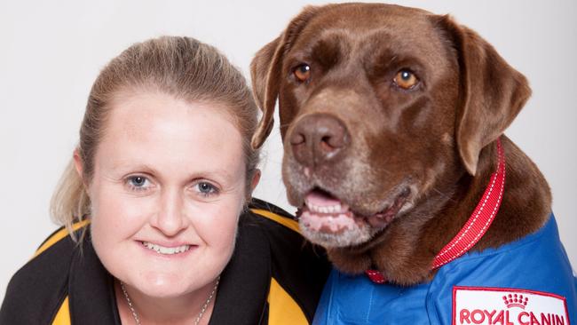 Petbarn Toowoomba store manager, Melita Carylon with a seeing eye dog.