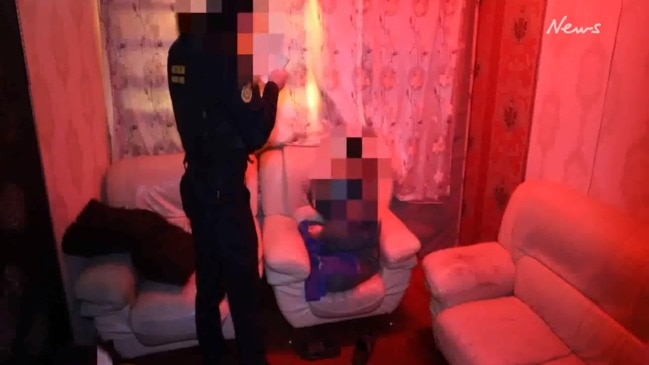 Dramatic footage shows police raiding a brothel with links to illegal sex workers