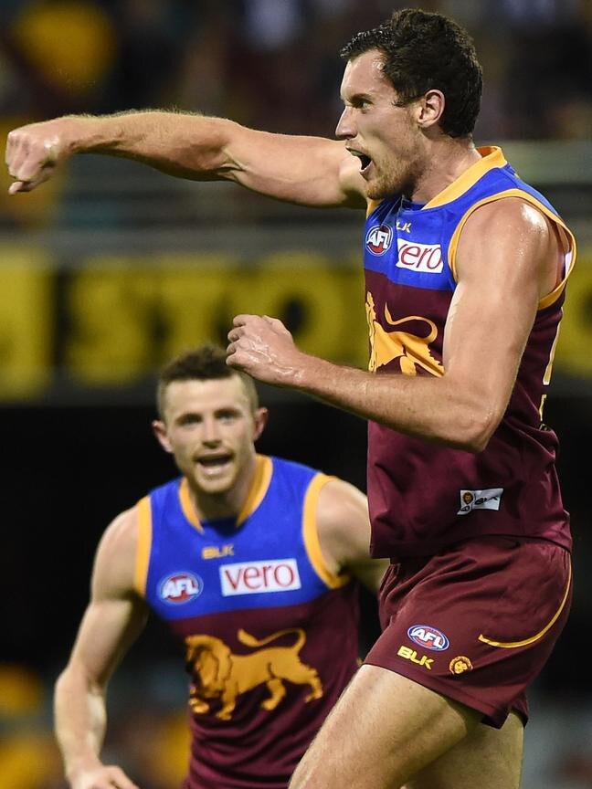 Matthew Leuenberger celebrates kicking a goal for the Brisbane Lions.