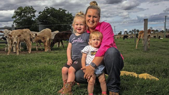 Young dairy farmer Stephanie Van der Westen with daughters Mai, 3 and Ari, 1. Picture: Zak Simmonds