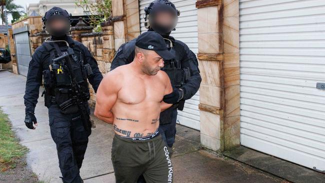 Police arrest Ayman Manly in Drummoyne in December last year. Picture: Max Mason-Hubers