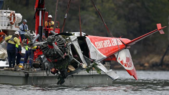 Marine Area Command officers recover the wreckage of a Sydney Seaplane that crashed into the water at Jerusalem Bay in Sydney’s north on New Year’s Eve. Picture: Richard Dobson.