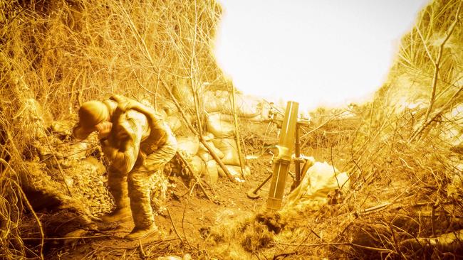 A Ukrainian soldier fires a mortar towards Russian positions near the town of Chasiv Yar in the Donetsk region on November 19. Picture: Ukraine Armed Forces/AFP