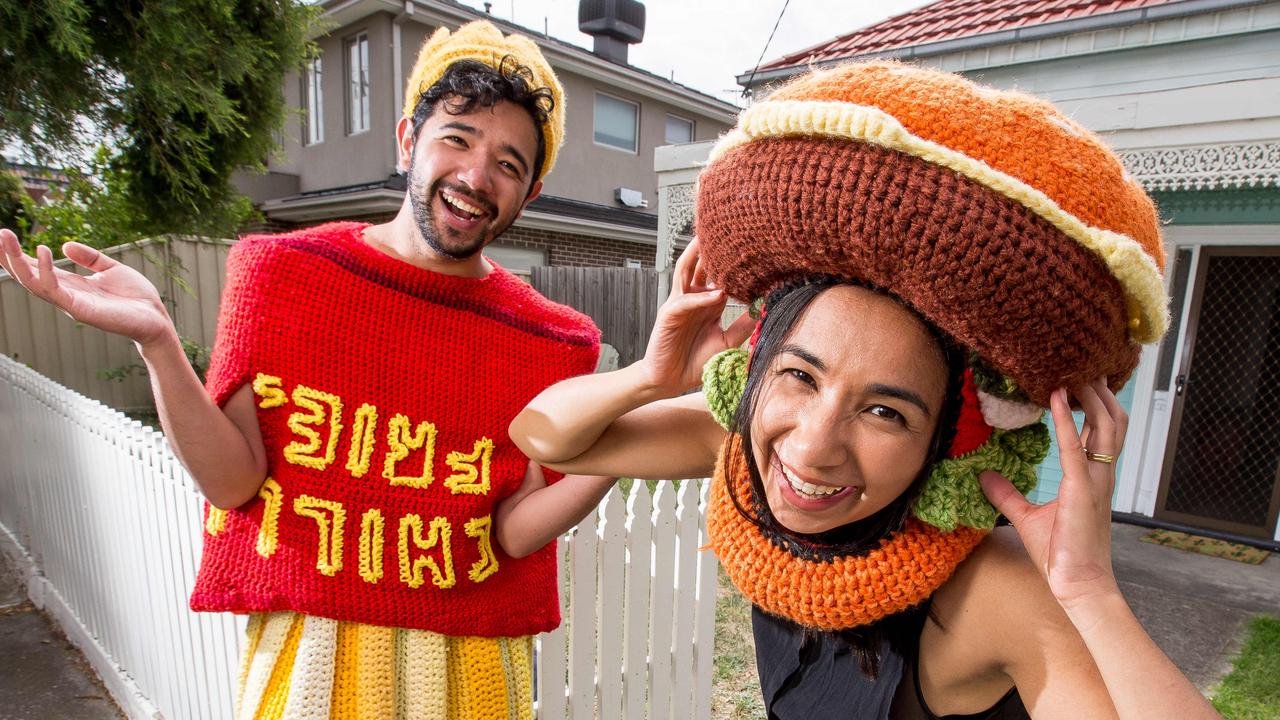 Extreme crochet artist Phil Ferguson in his French Fries creation with sister Freyla Thomas in his hamburger hat. Picture: Tim Carrafa