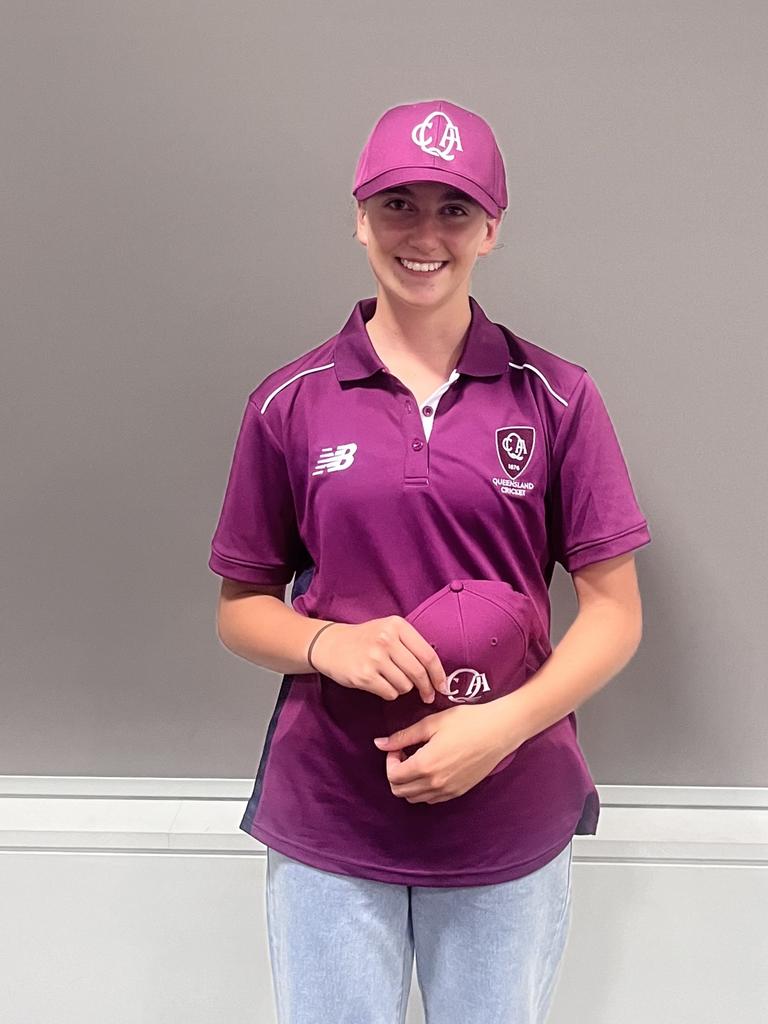 Lilli Hamilton after receiving her Queensland cricket caps for under-16s and under-19s.