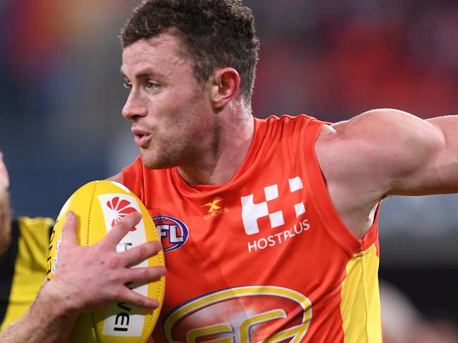 Suns player Pearce Hanley during the round 19 AFL match between the Gold Coast Suns and the Richmond Tigers at Metricon Stadium on the Gold Coast, Saturday, July 29, 2017.  (AAP Image/Dave Hunt) NO ARCHIVING, EDITORIAL USE ONLY