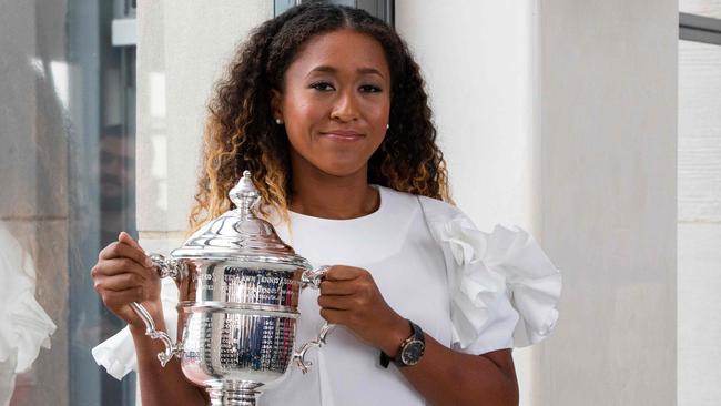 Amid the ongoing controversy, Japan’s Naomi Osaka celebrates her US Open win. Picture: AFP