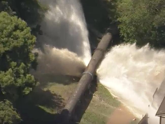 A major water pipe has burst in Sydney's south, resulting in masses of water spilling out. Emergency crews were called to the scene at Binya Place in Como to assess the damage, with sandbags offered to affected residents. Picture: ABC News