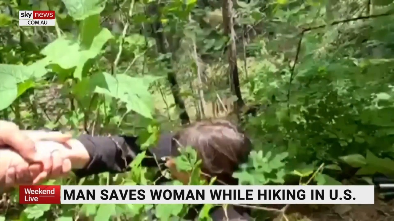 Hiker saves mother dangling from cliff in US