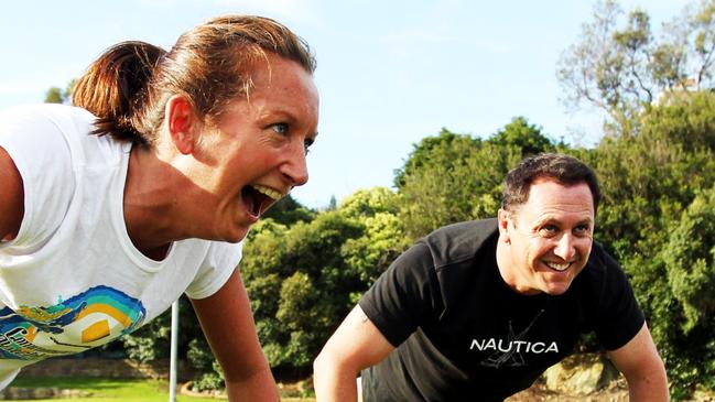 Larry Emdur working out with Layne Beachley.