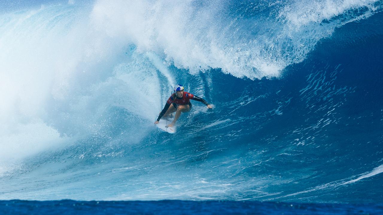 Molly Picklum wore a helmet for safety as she won through to the final eight in Fiji. Picture: Matt Dunber/World Surf League