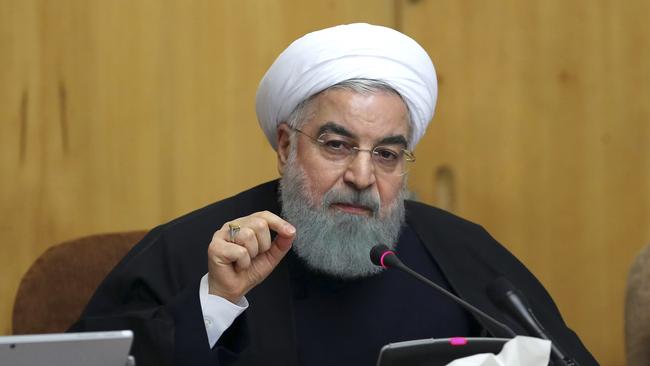 Iranian President Hassan Rouhani speaks in a cabinet meeting in Tehran, Iran on Sunday. He said people have the right to protest, but those demonstrations should not make the public "feel concerned about their lives and security." (Pic: Iranian Presidency Office via AP)