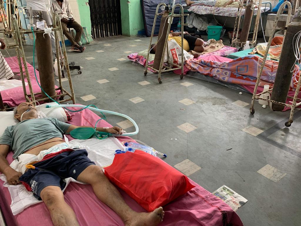 Coronavirus patients receive medical treatment at a ward of the Siliguri District Hospital in Siliguri. Picture: AFP