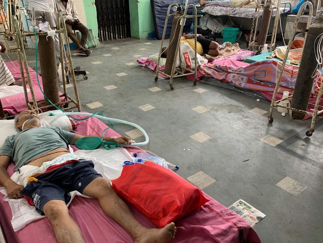 Coronavirus patients receive medical treatment at a ward of the Siliguri District Hospital in Siliguri. Picture: AFP