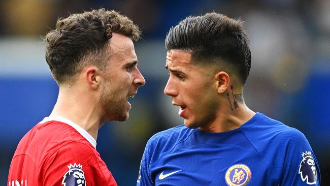 LONDON, ENGLAND - AUGUST 13: Diogo Jota of Liverpool clashes with Enzo Fernandez of Chelsea during the Premier League match between Chelsea FC and Liverpool FC at Stamford Bridge on August 13, 2023 in London, England. (Photo by Clive Mason/Getty Images)