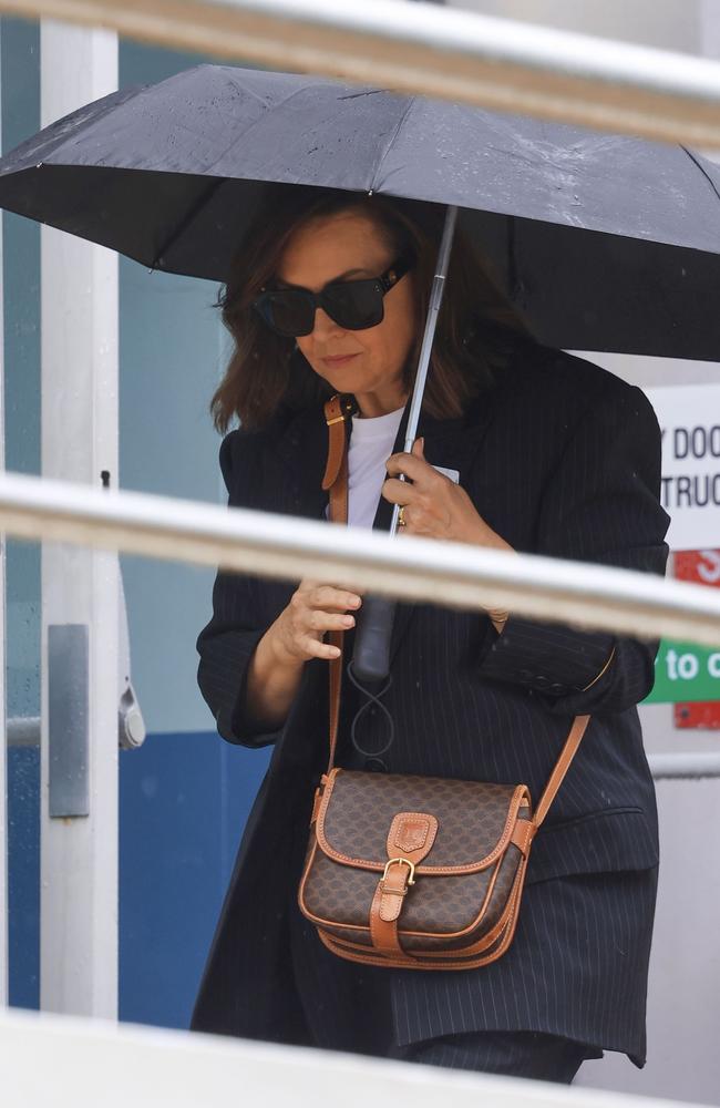 Lisa Wilkinson ditched the dress code and opted for a chic pinstripe suit instead. Picture: Media Mode