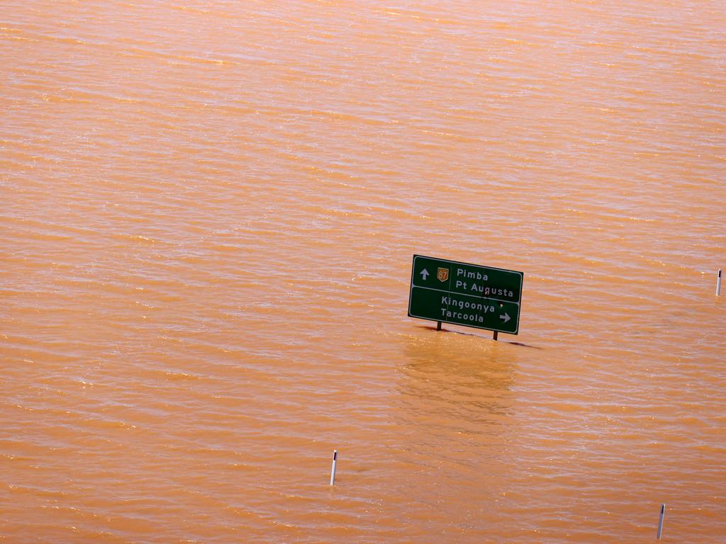 Despite the road being completely immersed, Premier Steven Marshall said the water was already subsiding. Picture: NCA NewsWire / Kelly Barnes