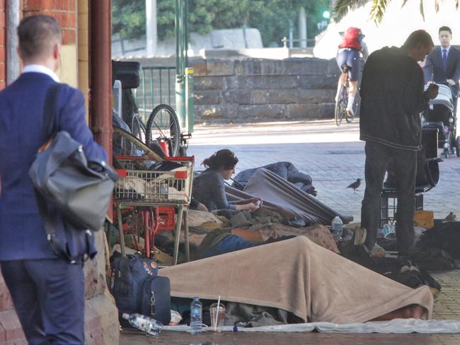 The homeless camp under the bridge on the corner of William and Flinders streets. Picture: Hamish Blair