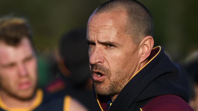 Doncaster East's senior coach Steve Buckle addresses his Players at 3/4 time during the EFL Division two match at Walker Reserve, Wantirna South, Melbourne, Saturday, May 26, 2018. Wantirna Sth v Doncaster East. (AAP Image/James Ross) NO ARCHIVING