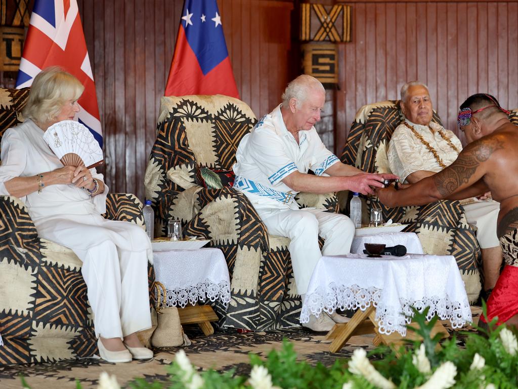 King Charles is presented with the kava, known as “ava” in Samoa. Picture: Getty Images